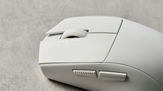 Photograph of Redragon M916 Pro mouse in white