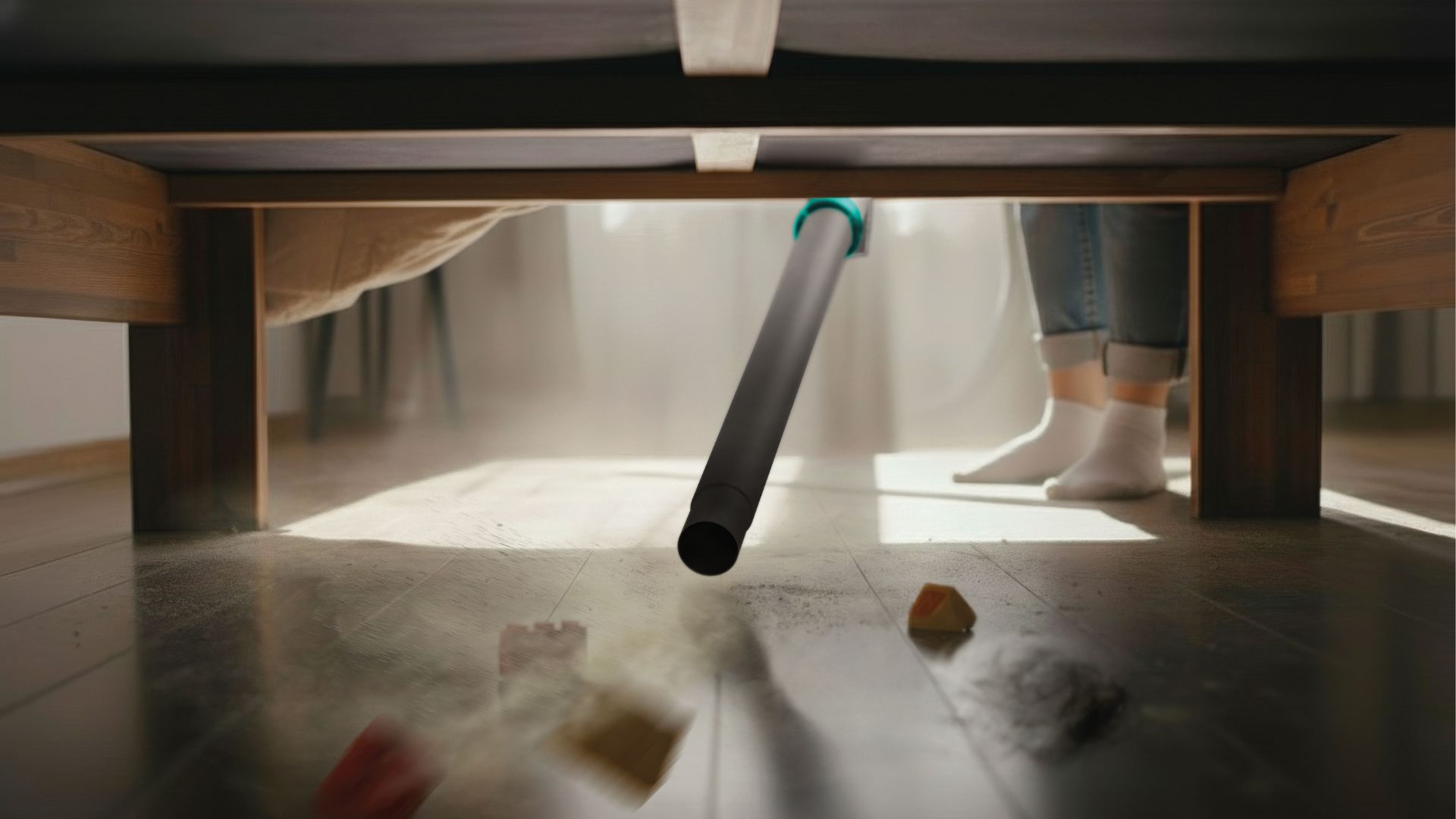 The Shark BlastBoss All In One Cleaner being used to clean under a counter