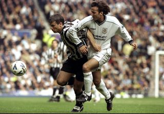 Newcastle's Rob Lee holds off Tottenham's Mauricio Taricco in the 1999 FA Cup semi-finals.