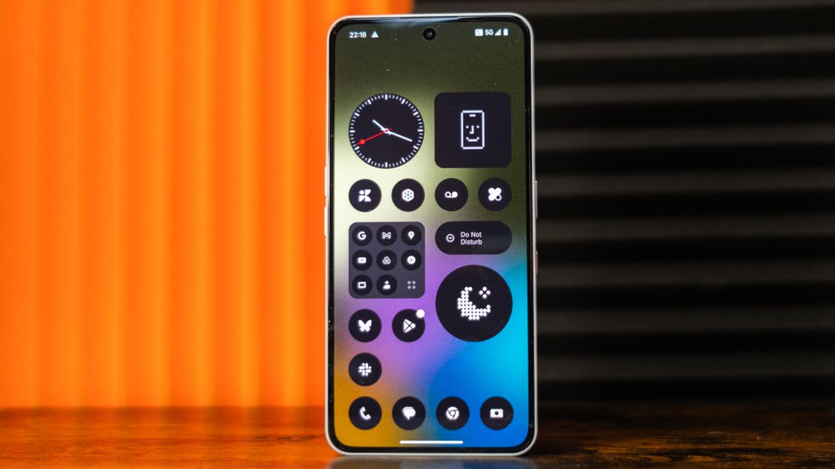 Nothing Phone (3a) Pro showing home screen with widgets and app icons in Nothing style