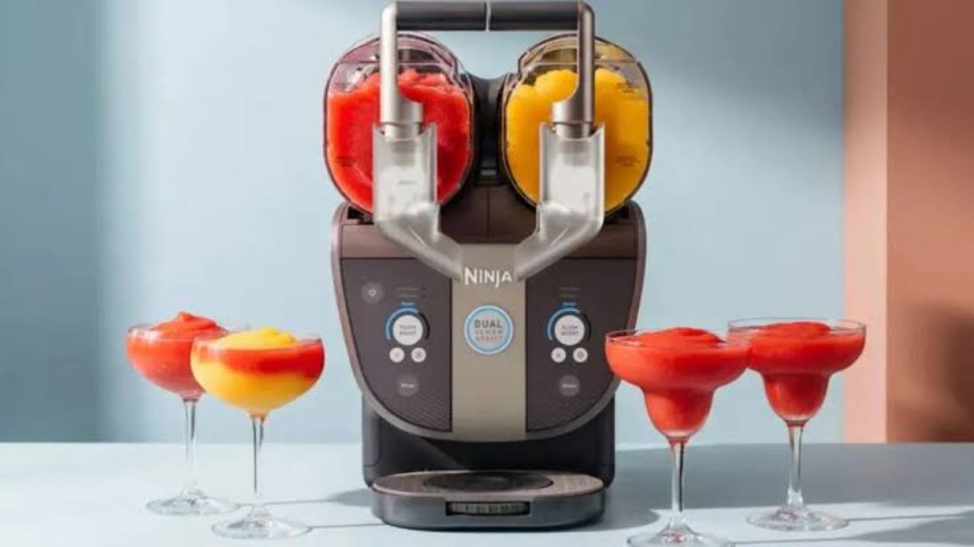 The Ninja Slushi Twist with frozen drinks around it, including the twist design