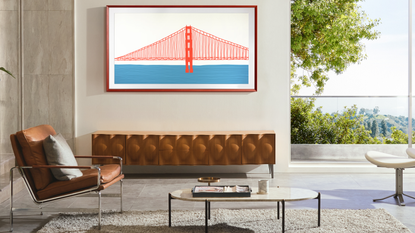 Samsung Frame TV with bevelled frame in Terracotta, wall-mounted in stylish living room