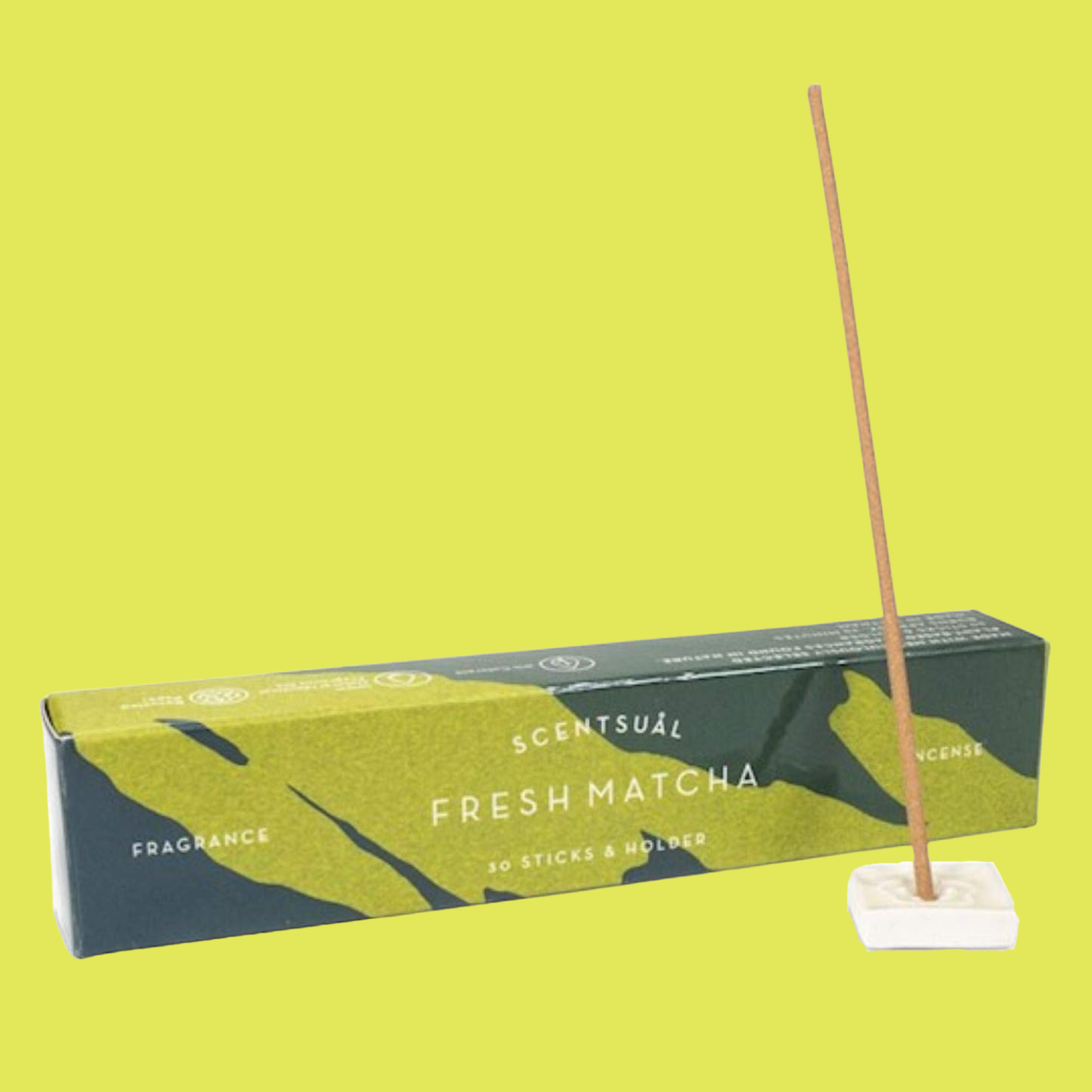 A pack of matcha incense sticks and a holder