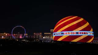 The Radio City Music Hall and Rockettes logo light up the Vegas Sphere.