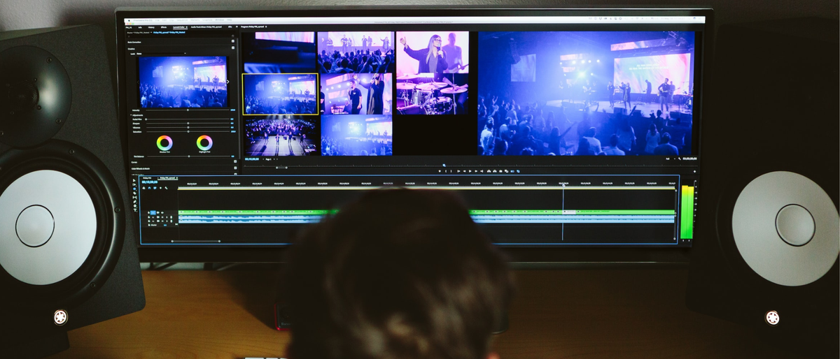 Man sitting in front of desktop video editor