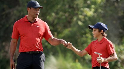 Tiger Woods playing golf with son Charlie Woods