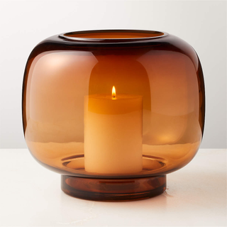 amber-colored candle hurricane