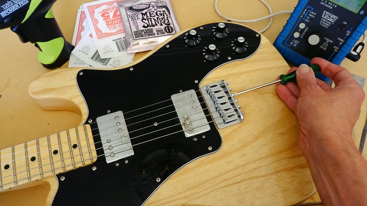 Adjusting intonation on an electric guitar