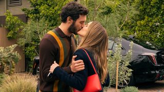 L-R: Noah (Adam Brody) and Joanne (Kristen Bell) kiss in a scene from Netflix's "Nobody Wants This" season 2