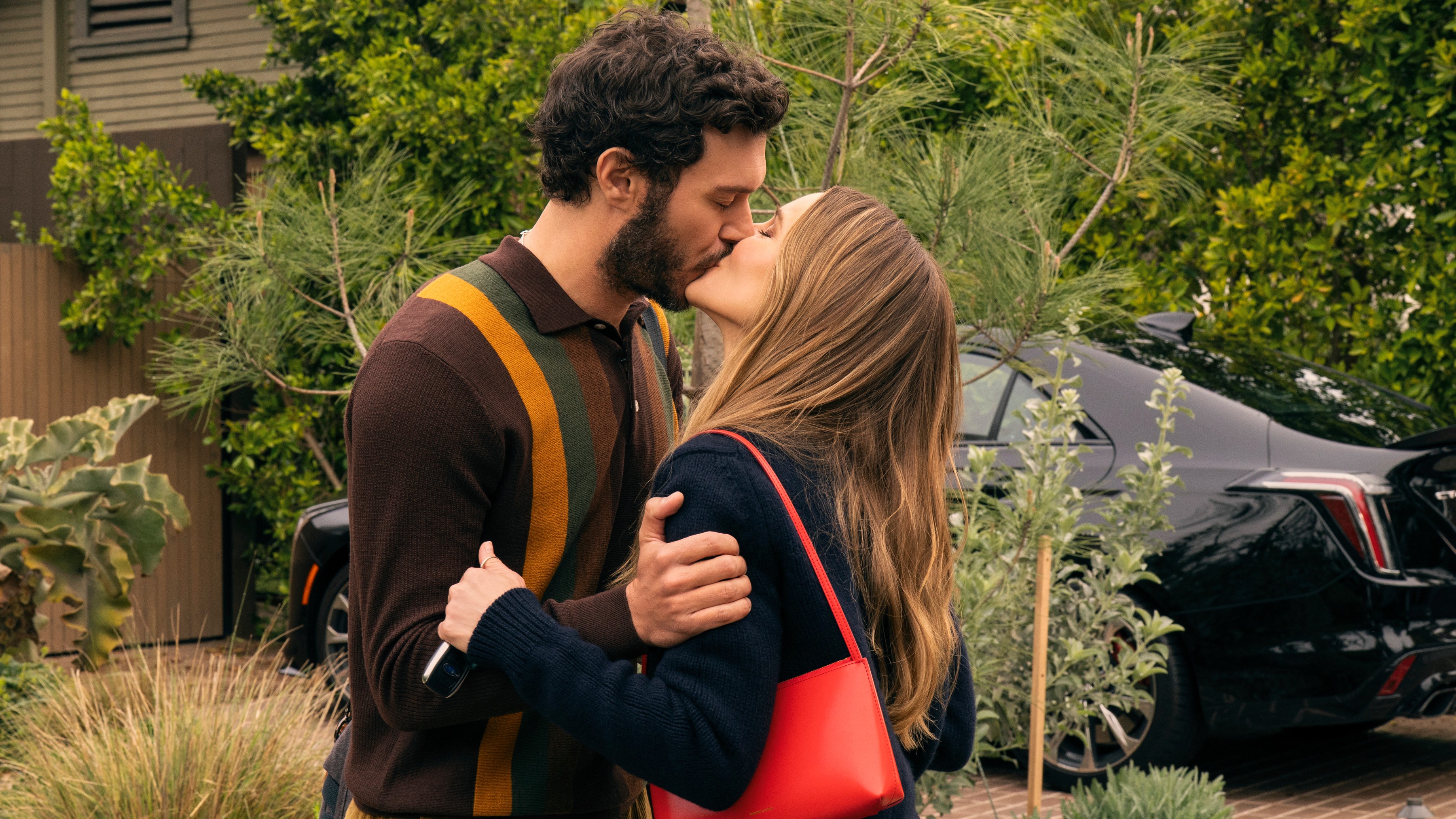 L-R: Noah (Adam Brody) and Joanne (Kristen Bell) kiss in a scene from Netflix&#039;s &quot;Nobody Wants This&quot; season 2