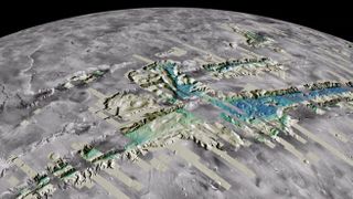 3D map of mars' valles marineris canyon system, in shades of gray, blue and green