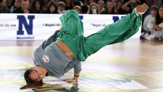 US breaker Logan Edra (&quot;Logistx&quot;) performs onstage during the 1 on 1 B-Girls Top 32 at the WDSF World Breaking Championship