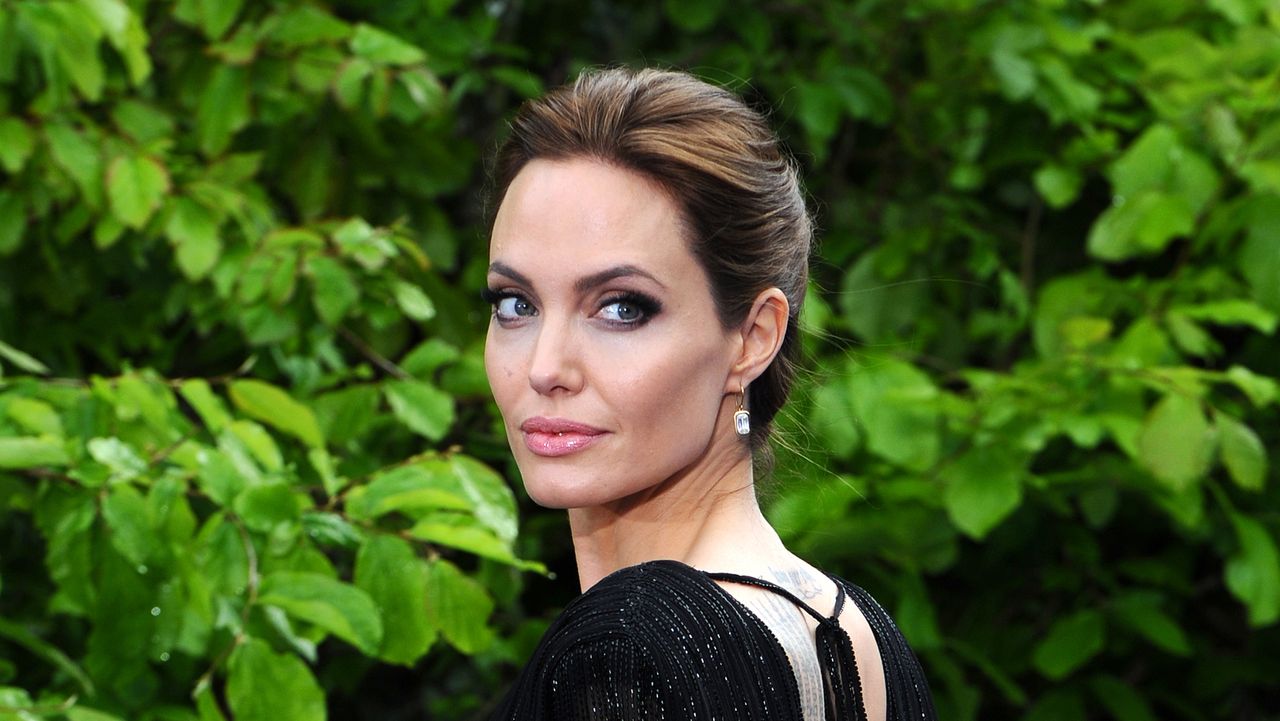 Angelina Jolie attends a private reception as costumes and props from Disney&#039;s &quot;Maleficent&quot; are exhibited in support of Great Ormond Street Hospital at Kensington Palace on May 8, 2014 in London, England