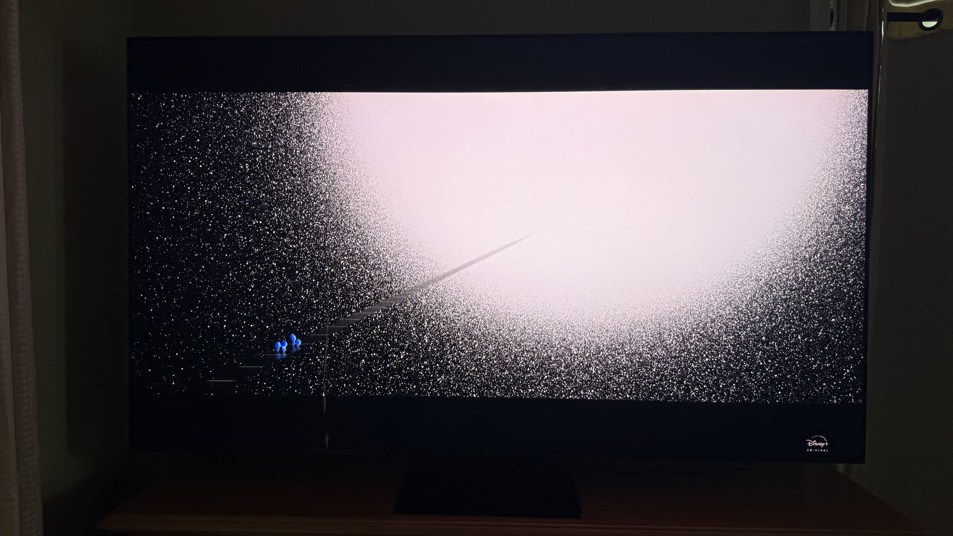The TCL QM7L TV showcases its Halo Control via a scene from the movie Soul