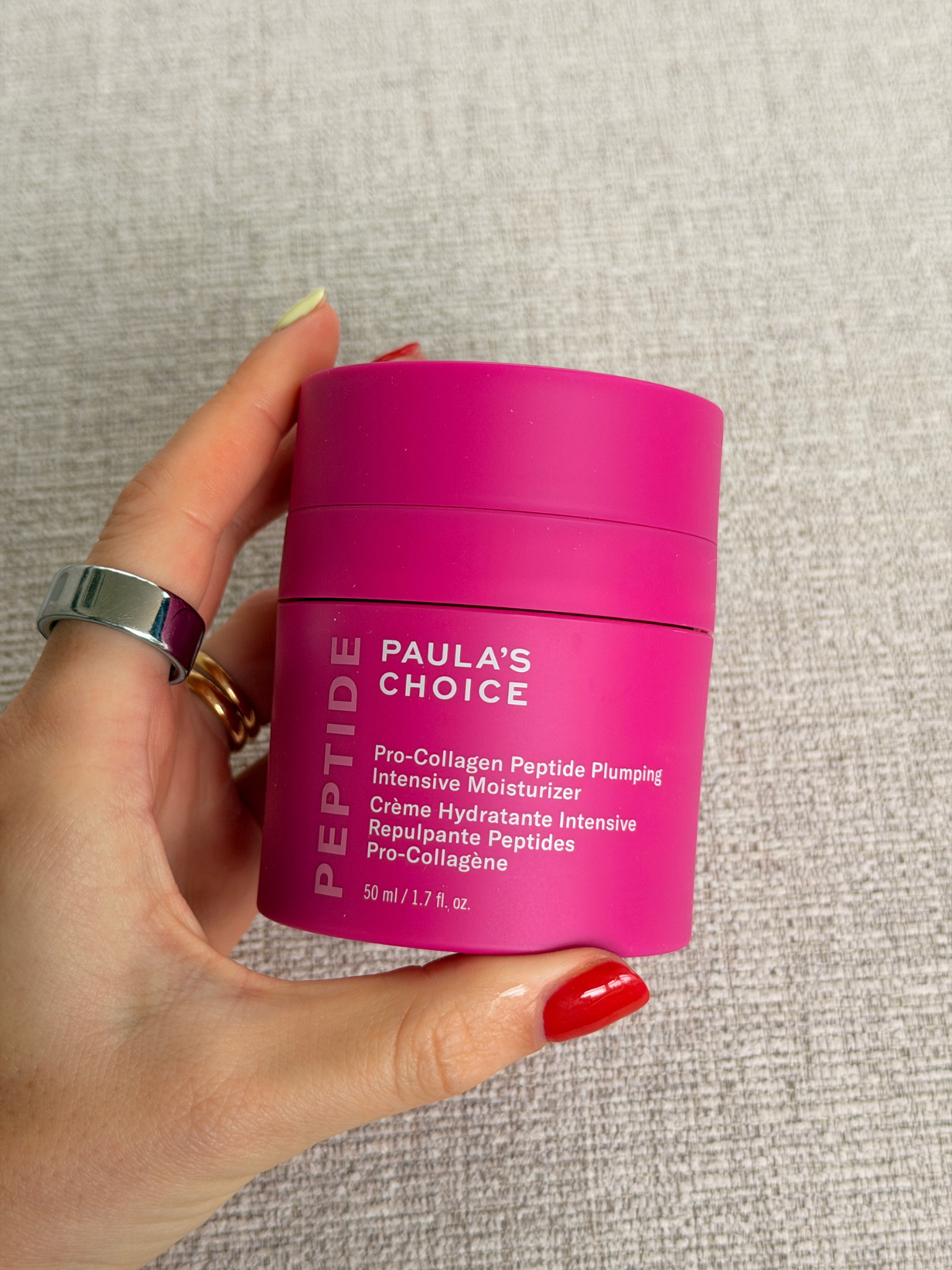 Freelance beauty editor Grace Day holding the Paula's Choice moisturiser