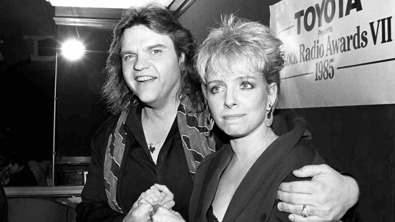 Meat Loaf and Ellen Foley posing for a photograph in the 1980s