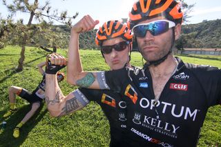 Phil Gaimon (right) and Brad Huff show off their "clean" tattoos while Scott Zwizanski clowns in the background.