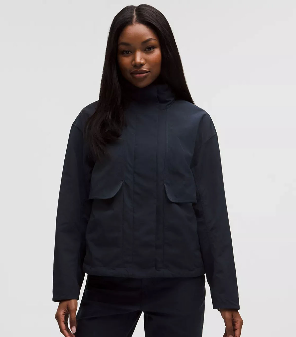 a navy high collar jacket