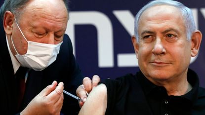 Benjamin Netanyahu receives a coronavirus vaccine at the Sheba Medical Center, the country's largest hospital.