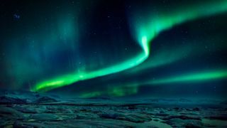 Aurora borealis over iceland landscape