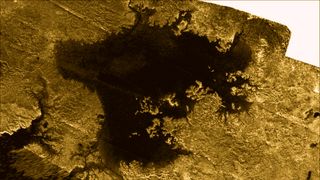 The surface of Titan is wet with hydrocarbons. This image from NASA's Cassini probe shows a lake on the face of Saturn's largest moon.