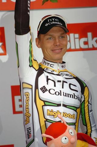 Tony Martin (HTC-Columbia) celebrates his victory in the final time trial.