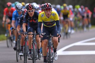 Rohan Dennis works for his Ineos Grenadiers teammates while leading the Tour de Romandie on stage 2