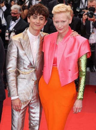 CANNES, FRANCE - JULY 12: Timothée Chalamet and Tilda Swinton attend the "The French Dispatch" screening during the 74th annual Cannes Film Festival on July 12, 2021 in Cannes, France. (Photo by Mike Marsland/WireImage)