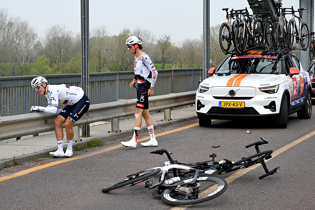 SANREMO, ITALY - MARCH 21: (L-R) Orluis Aular of Venezuela and Team Movistar and Jan Christen of Switzerland and UAE Team Emirates - XRG react after crash during the 117th Milano-Sanremo 2026, Men&amp;apos;s Elite a 298km one day race from Pavia to Sanremo / #UCIWT / on March 21, 2026 in Sanremo, Italy. (Photo by Dario Belingheri/Getty Images)