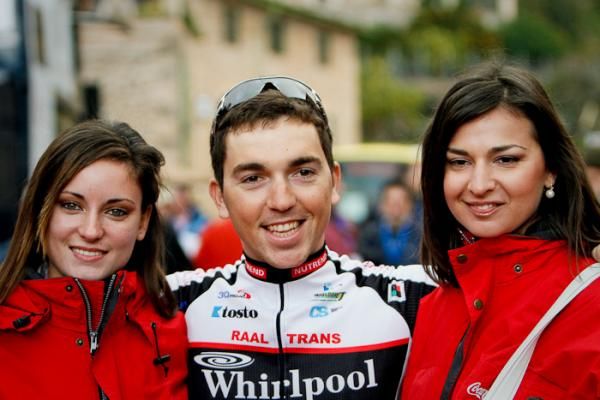 Rookie rider Marc Reynes (PSK Whirlpool-Author) from Dei&agrave; and also younger brother of Vicente Reynes (HTC-Columbia), surrounded by the podium girls at the start of the stage.