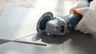 cutting a tile with an angle grinder