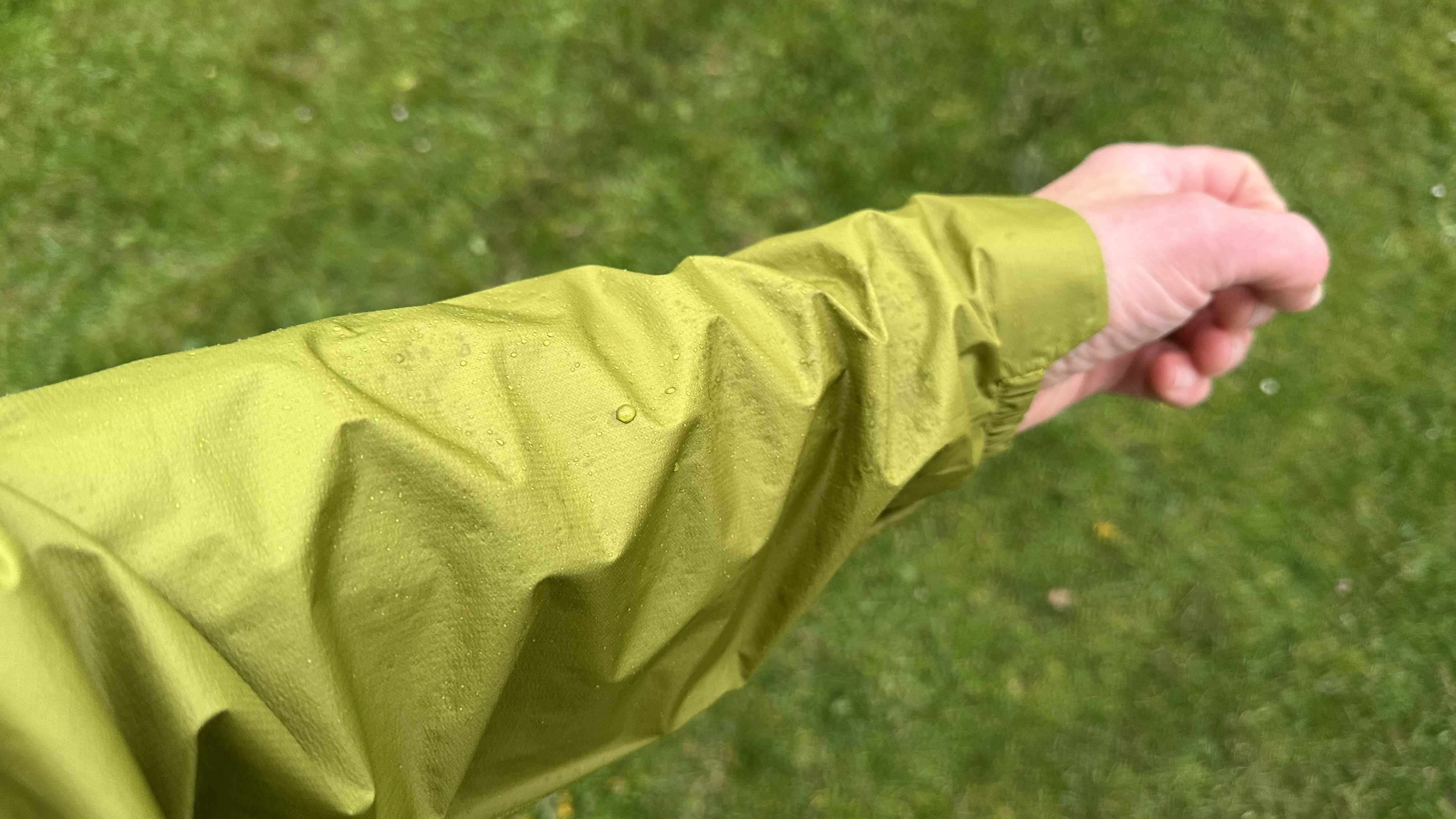 Surface of the OR Helium UL Jacket showing water beading