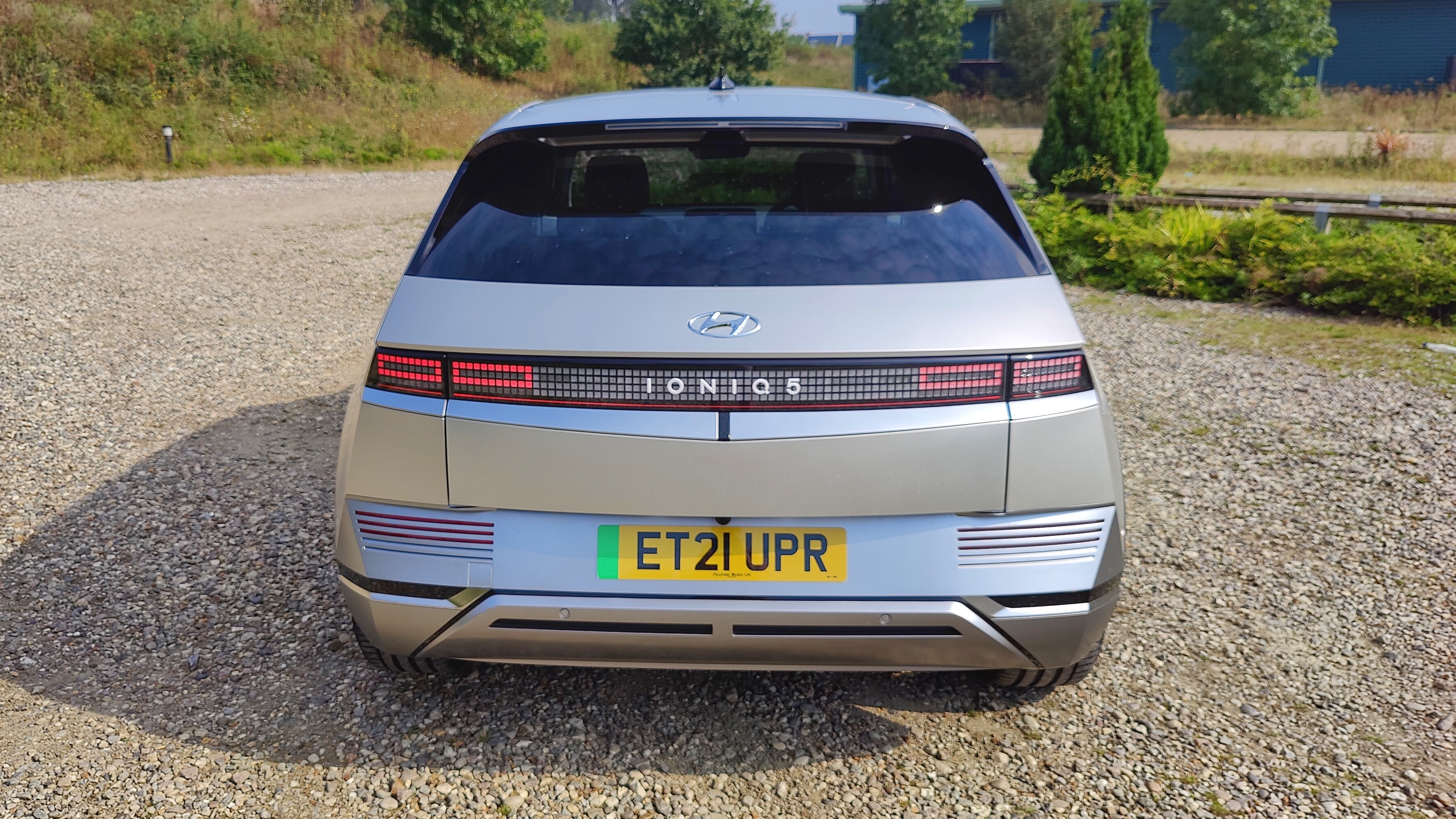 Rear-on view of Ioniq in gravel parking lot