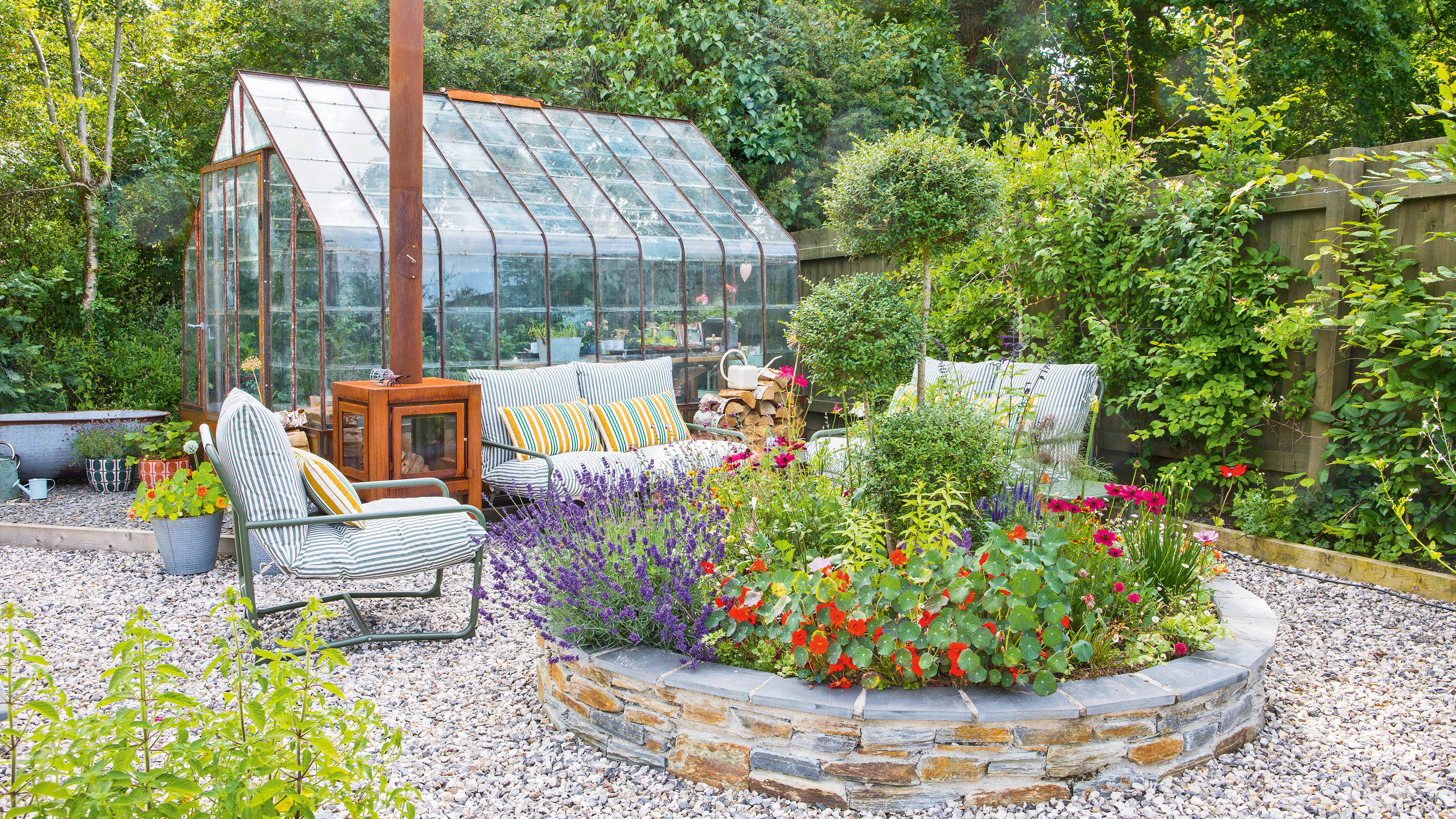 Tour this Cornish garden complete with a greenhouse, pergola and outdoor kitchen