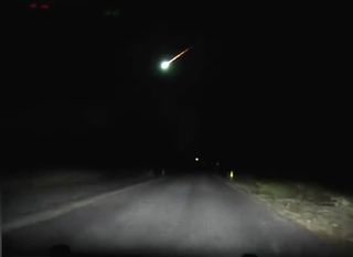 A dazzling fireball streaks across the sky in this still from the dash-cam video of Sgt. Michael Virga, of the Township of Hamilton Police Department in New Jersey, on Dec. 2, 2017.
