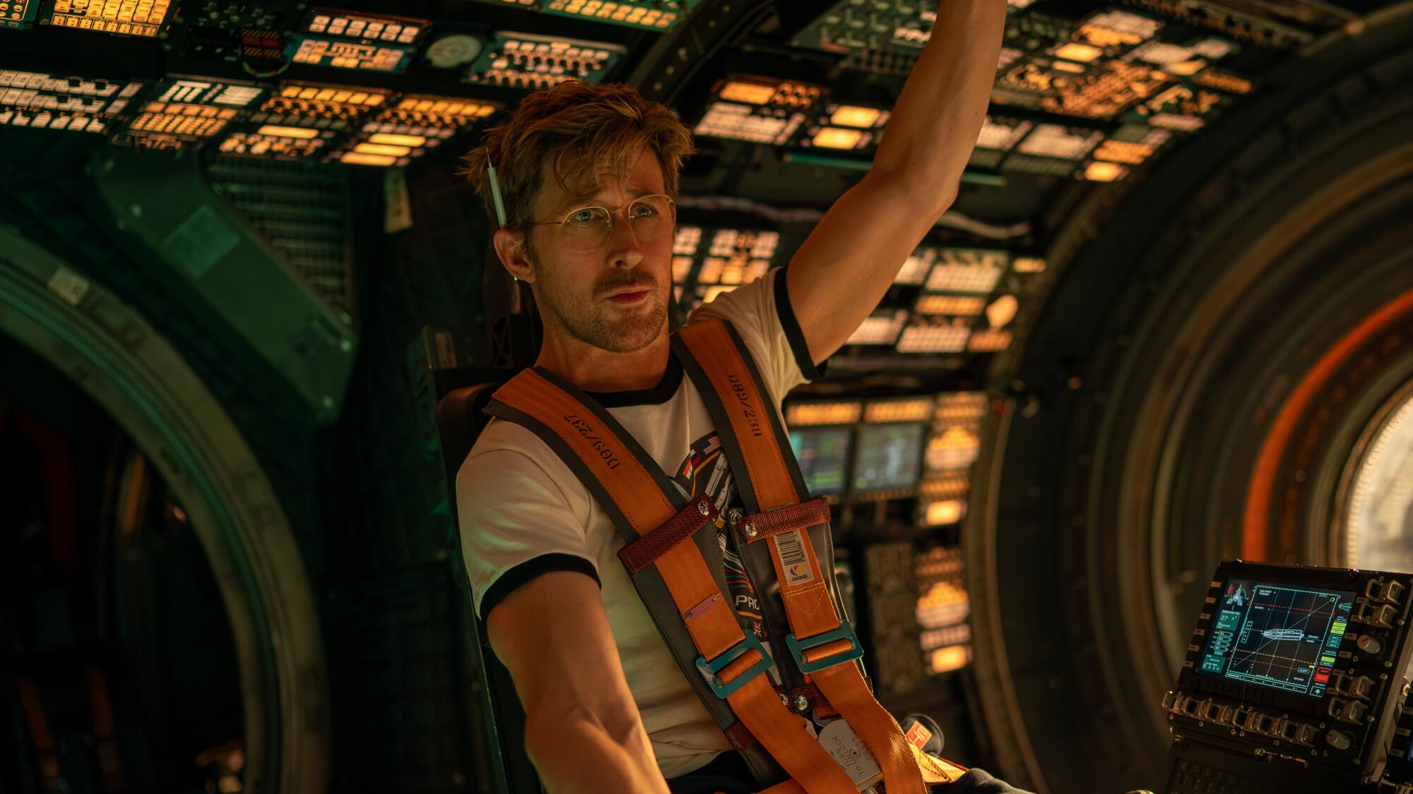 an astronaut on the bridge of a spaceship