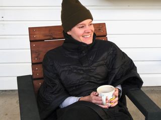 Image shows Anne-Marije Rook wearing the Enve Primaloft Insulated Poncho