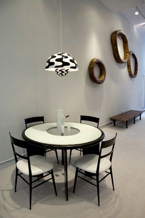 Chairs, table, hanging lamp in black and white colour