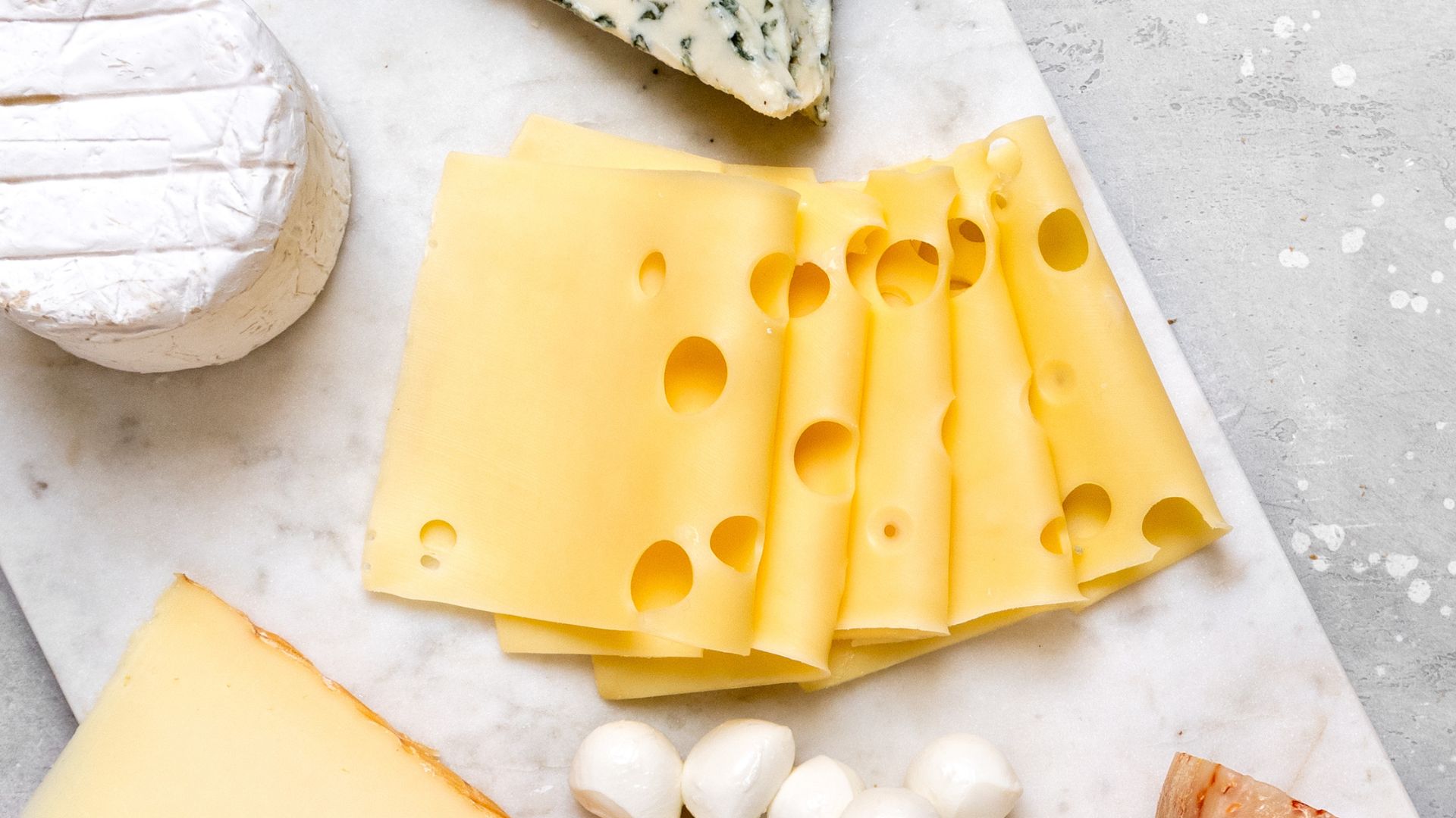 Cheese on chopping board