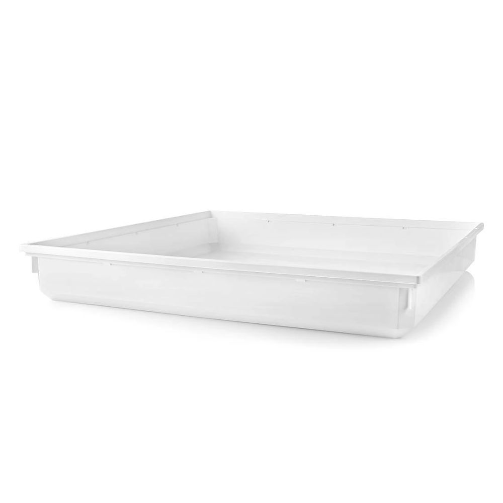 A white plastic drip tray for a washing machine
