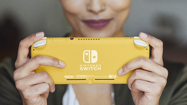 Holding Nintendo Switch Lite