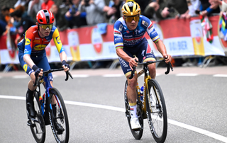 Mattias Skjelmose of Denmark and Team Lidl - Trek and Remco Evenepoel of Belgium and Team Soudal Quick-Step compete in the chase group during the 59th Amstel Gold Race 2025