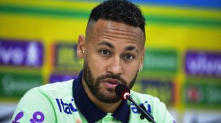 Neymar of Brazil speaks during a press conference