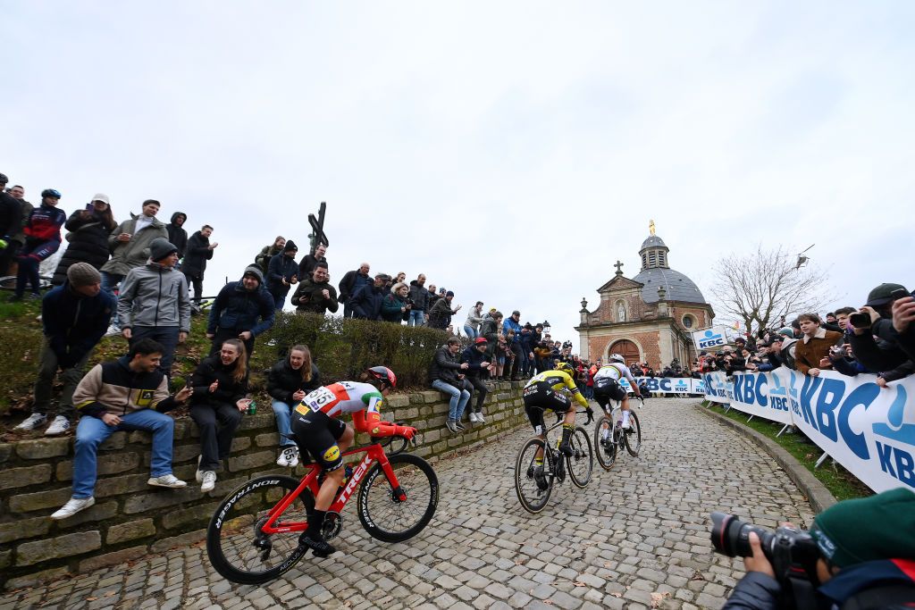 NINOVE BELGIUM FEBRUARY 24 LR Elisa Longo Borghini of Italy and Team LidlTrek Marianne Vos of The Netherlands and Team Visma Lease A Bike and Lotte Kopecky of Belgium and Team SD WorxProtime compete in the breakaway climbing the Muur van Geraardsbergen while fans cheer during the 16th Omloop Het Nieuwsblad 2024 Womens Elite a 1271km one day race from Ghent to Ninove UCIWWT on February 24 2024 in Ninove Belgium Photo by Alex BroadwayGetty Images