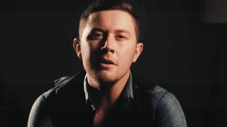 Scott McCreery in the music video for "Five More Minutes."