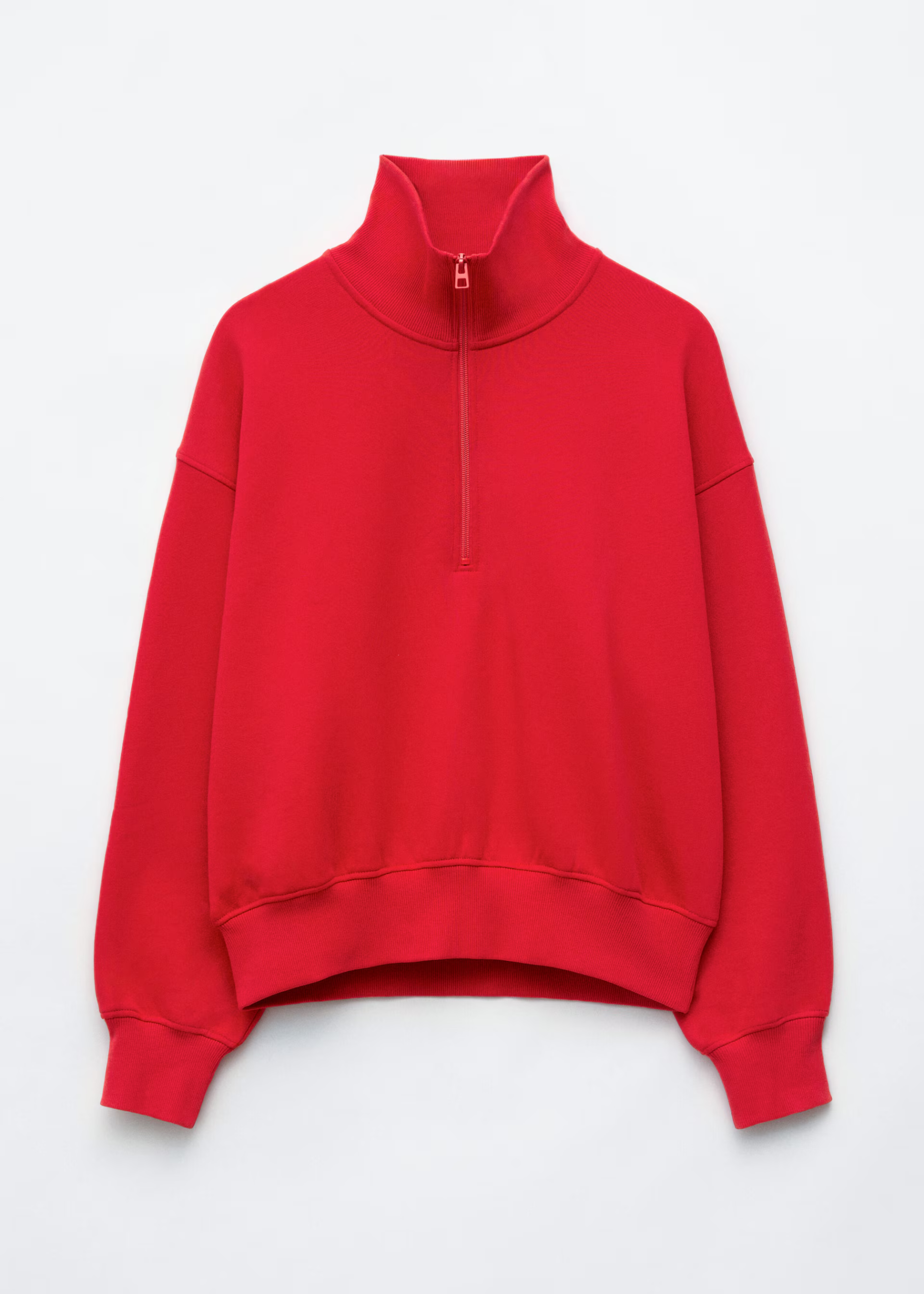 A red &amp;amp; Other Stories half-zip sweatshirt.