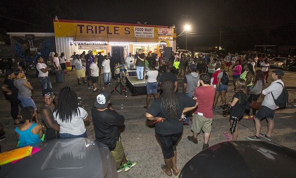 Protesters outside of the Baton Rouge store where Alton Sterling was killed.