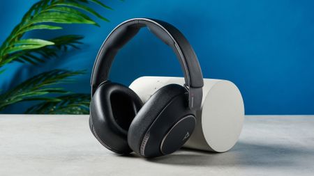 A black HP Poly Voyager Surround 80 UC wireless work-first headset