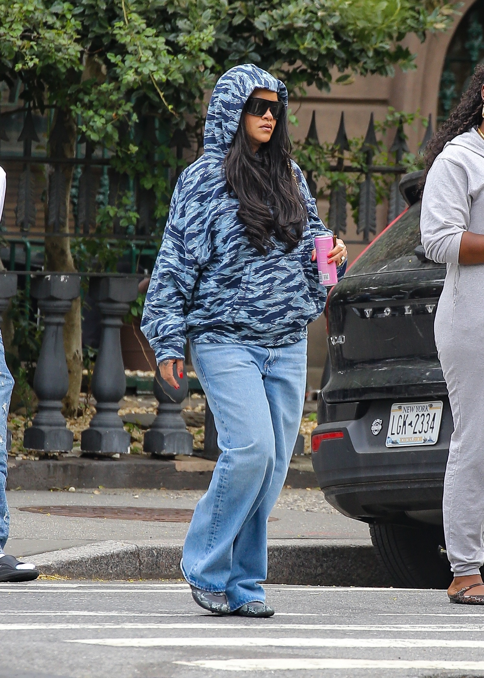 Rihanna wore the tiger-print trend with jeans and snakeskin Miu Miu sneakers