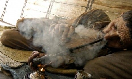 Smoking opium in Afghanistan